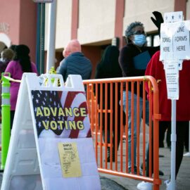 Residents in Cobb County line up to vote in the Georgia runoff election.