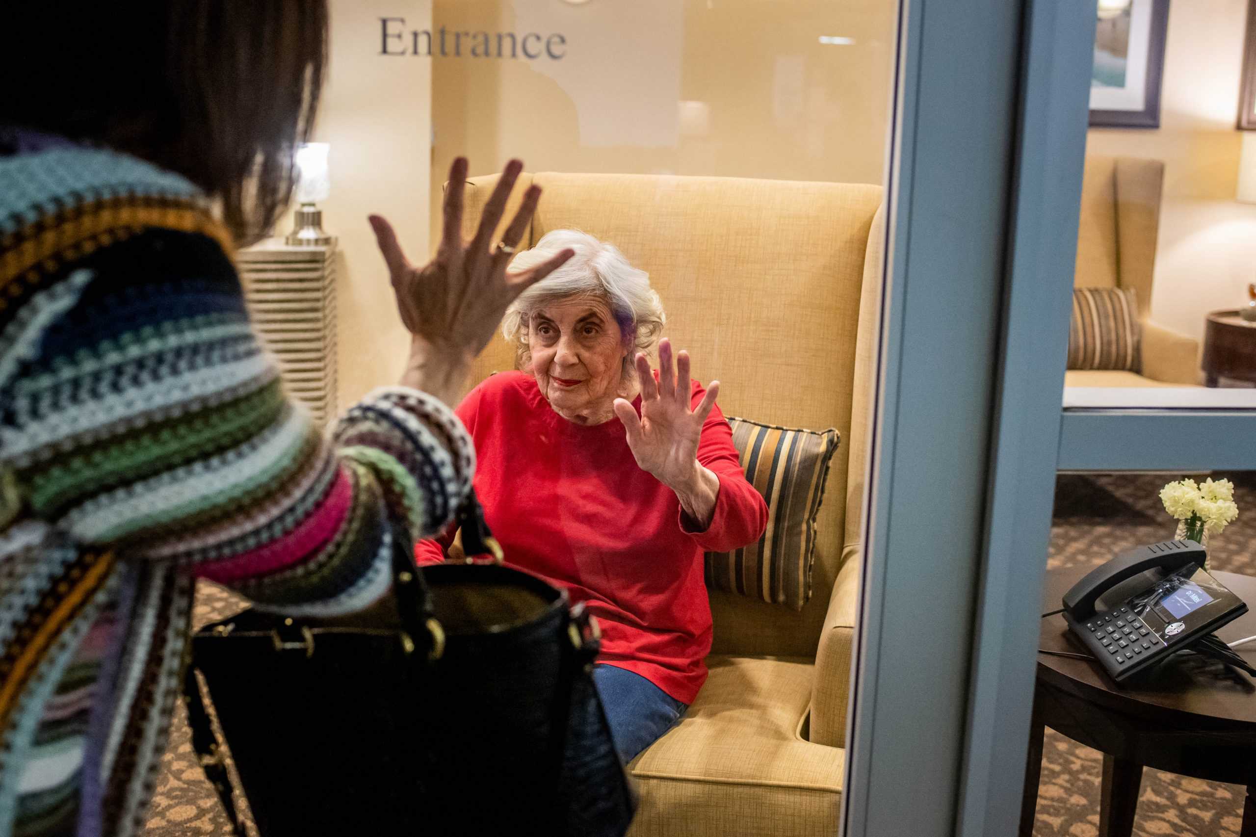 Karen Klink, of Hermosa Beach, visits her 86-year-old mother Cynthia Tachner at Silverado Beach Cities Memory Care in Redondo Beach