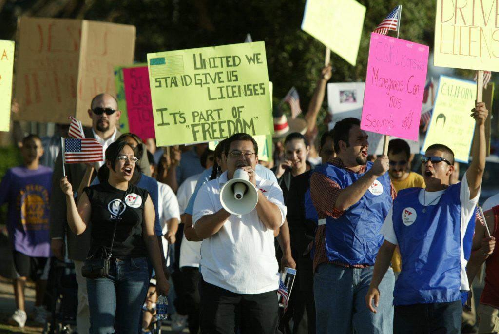 About 150 people marched in 2004 in support of a bill to allow undocumented immigrants the right to apply for a driver's license in California.