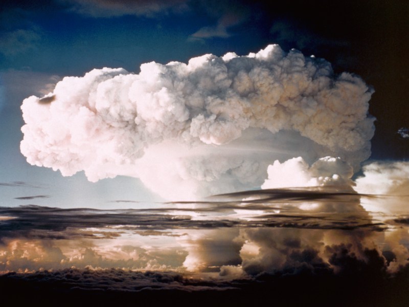 A white mushroom cloud over the ocean after the Ivy Mike hydrogen bomb test.