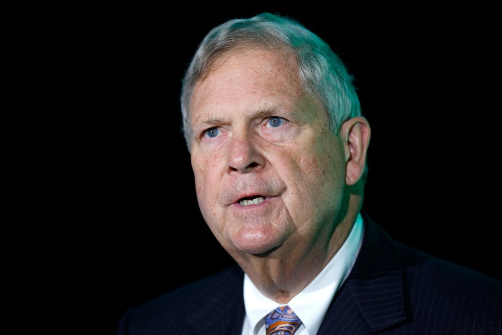 A close-up of Tom Vilsack's face as he is speaking. 