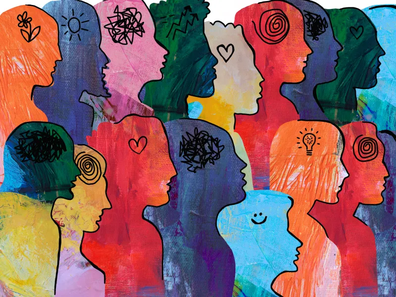 Colorful profile of illustrations of a diverse collection of profiles. Heads also have drawn symbols such as hearts, suns, lightbulbs and more.